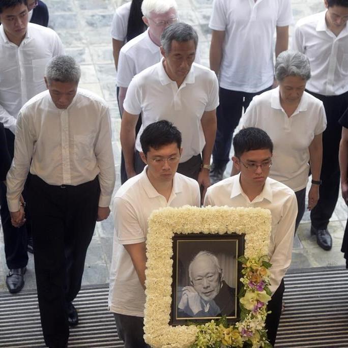Lee Kuan Yew's youngest son says the UK has granted him asylum from persecution in Singapore